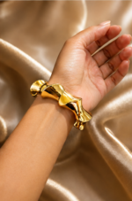 Gold Tone Sculpted Twist Open Cuff Bangle